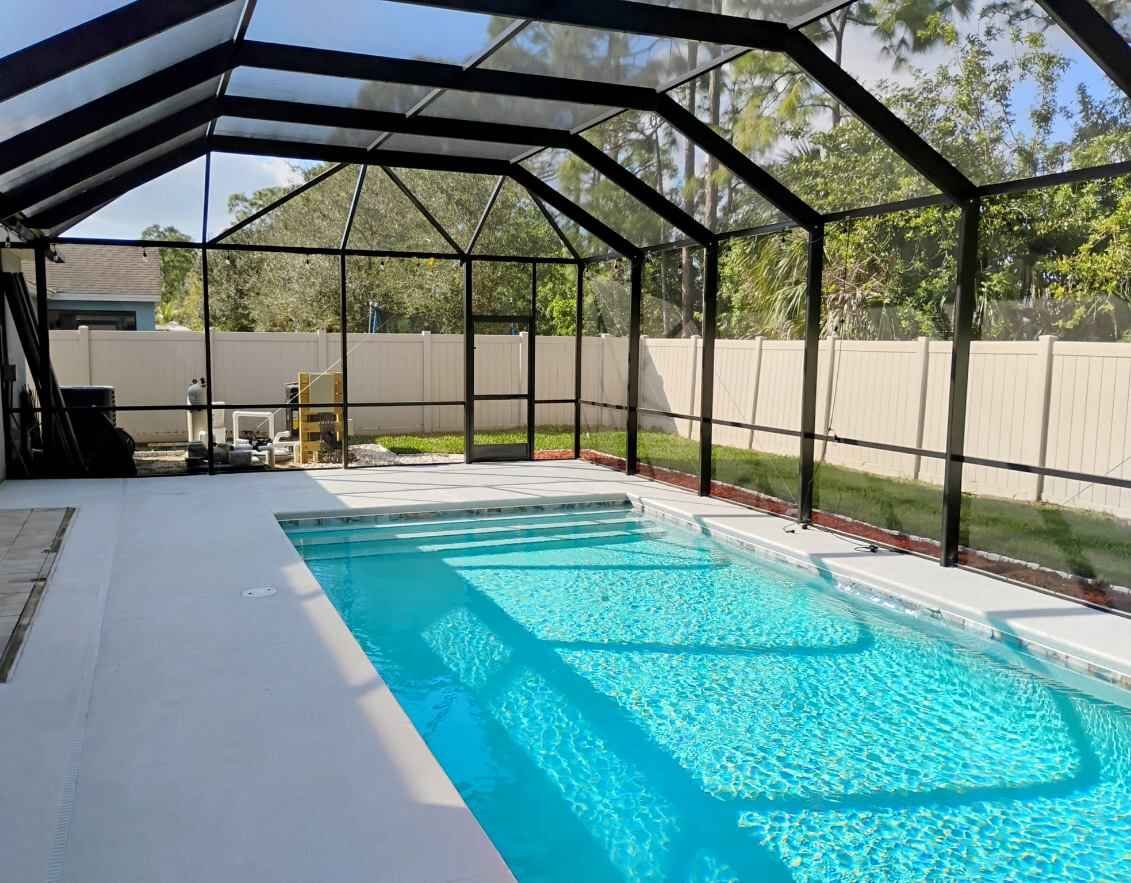 New pool screen enclosure installation over residential swimming pool in Lakeland, FL